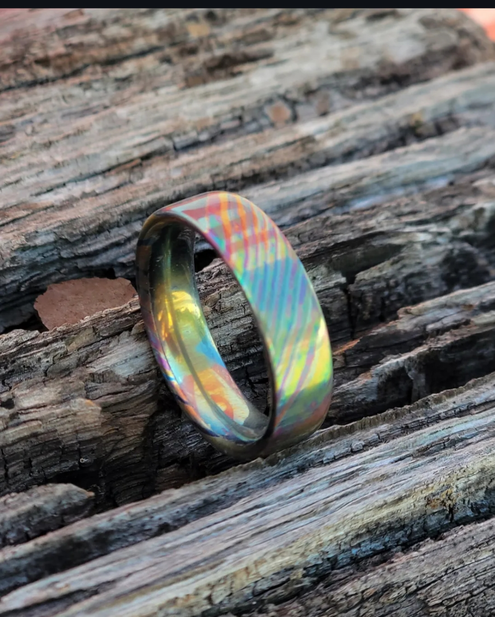 SUPERNOVA Double anodized titanium damascus with titanium liner