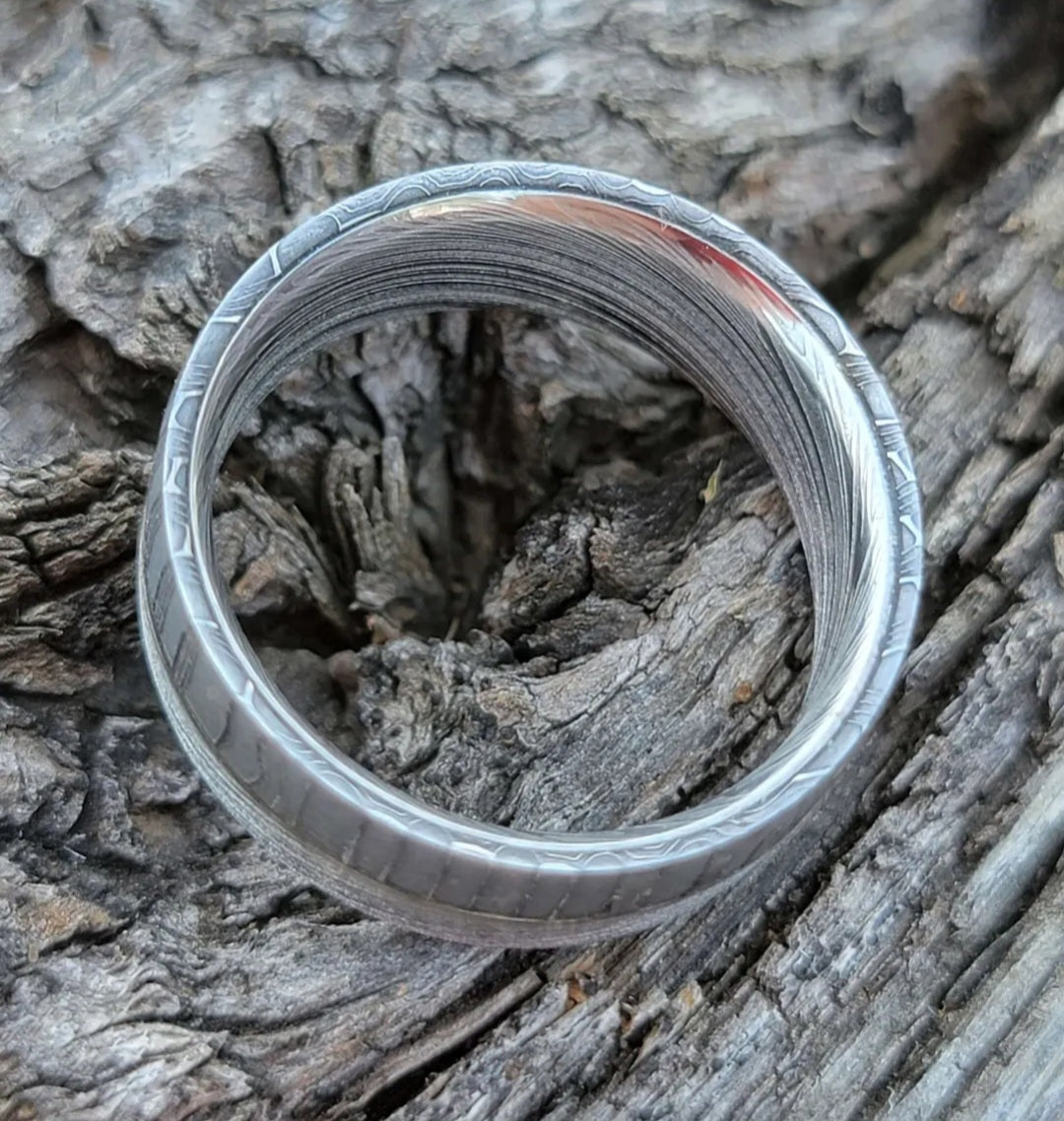 The Split Descision Damascus Timascus Ring